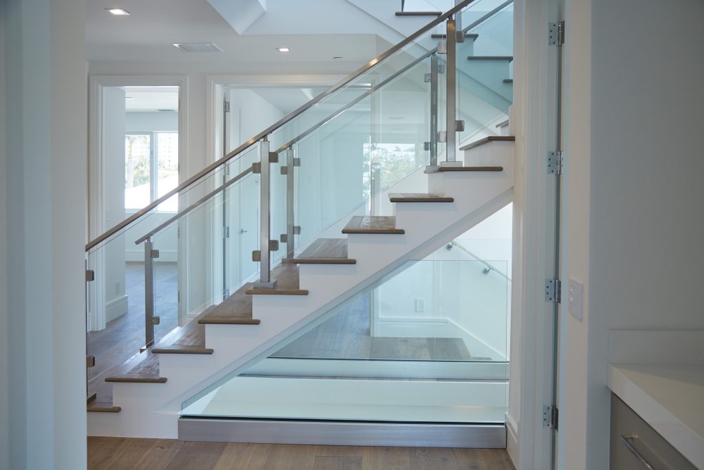 Bordered Glass Railing on floating Stairs