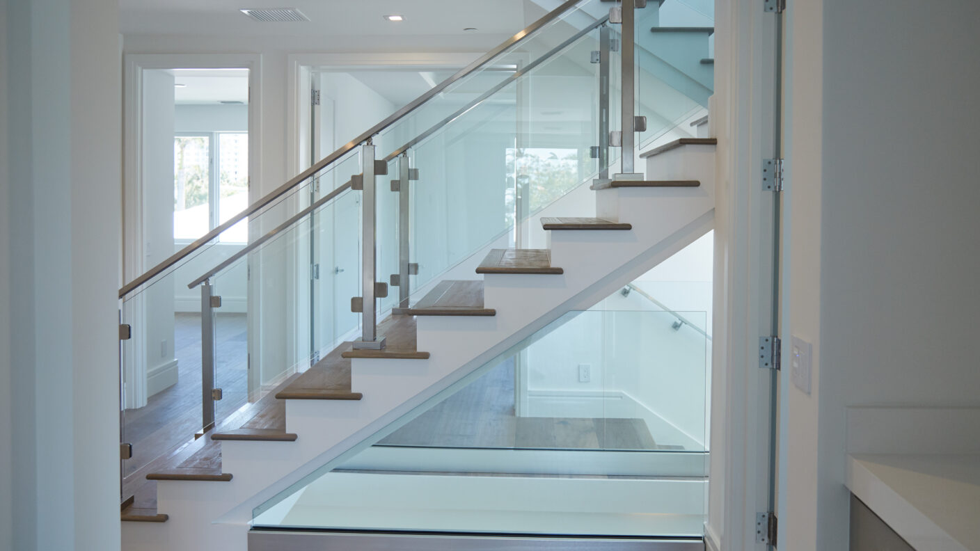 Bordered Glass Railing on floating Stairs