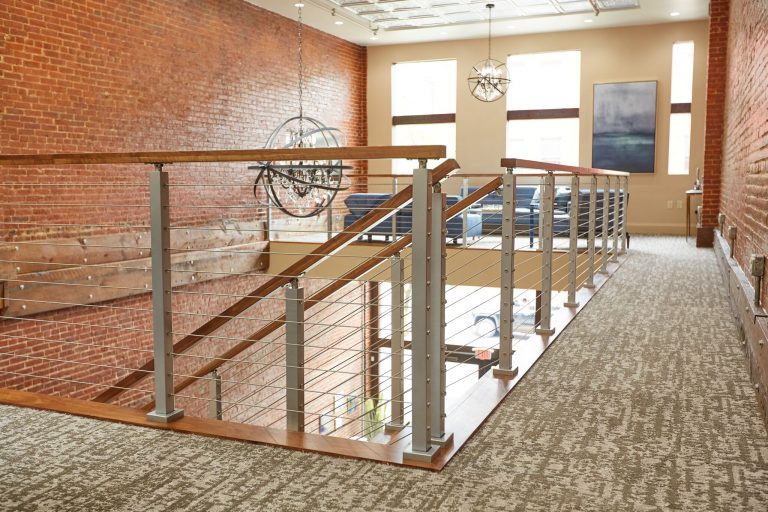 stainless steel cable railing and wooden handrail