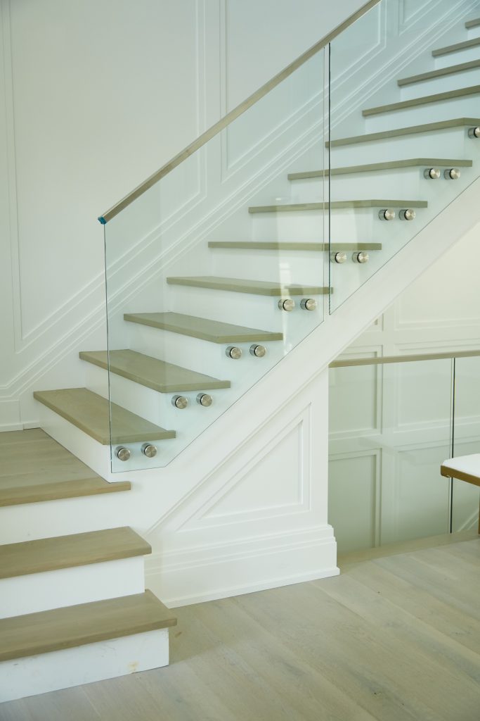 Interior Floating Staircase with Glass railing and standoff pins