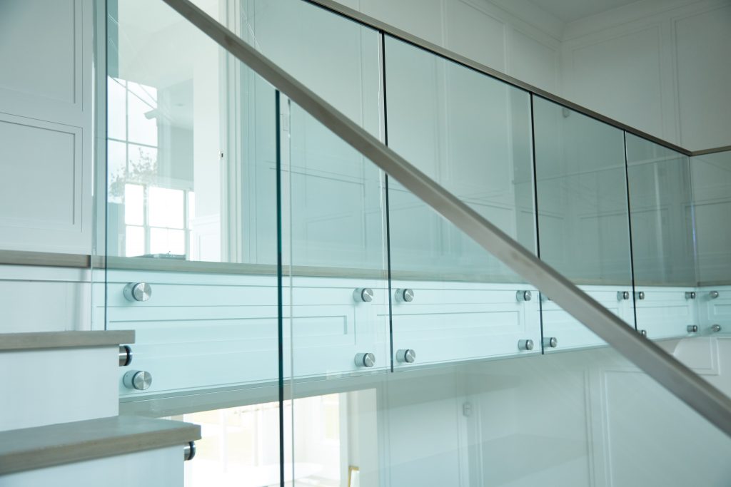 frameless glass railing on stairs
