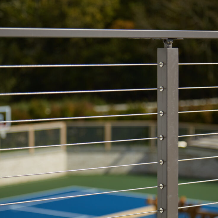 Cable railing grey posts and grey handrail detail