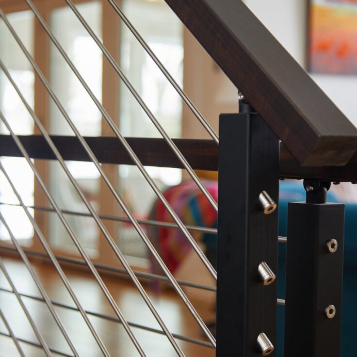 Rod railing on a floating staircase