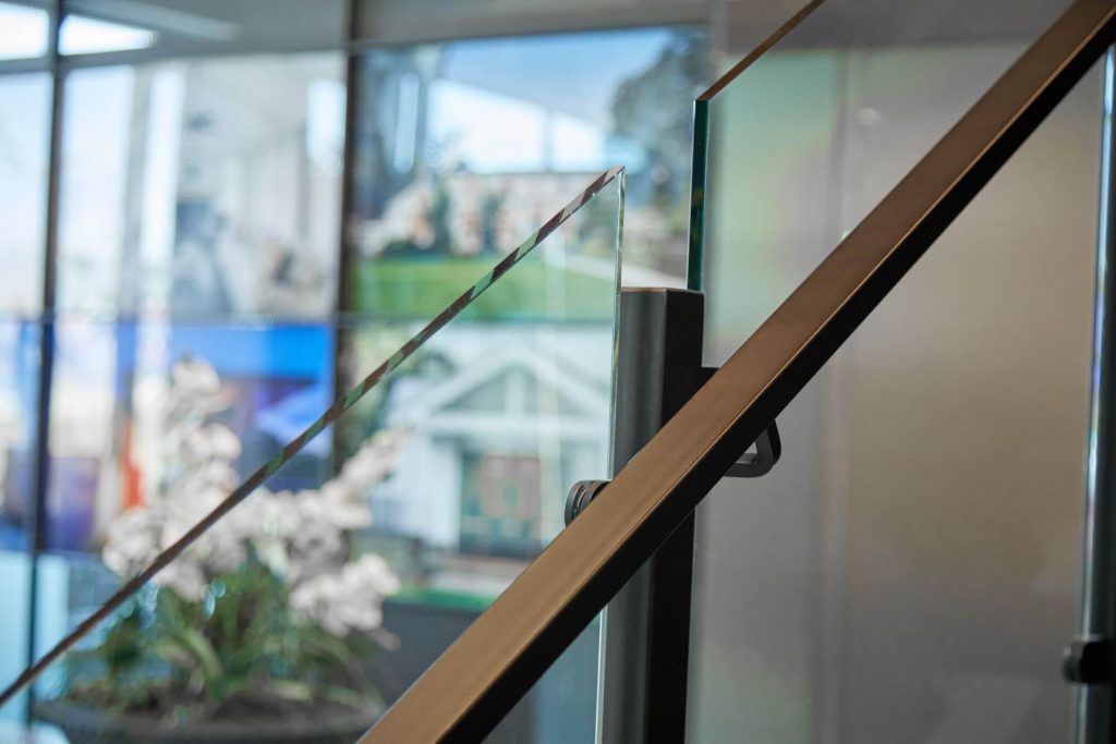 Close Up of Handrail and Glass Panels
