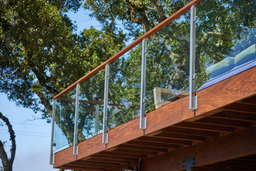 Side Mounted Posts with Glass Railing for Decks