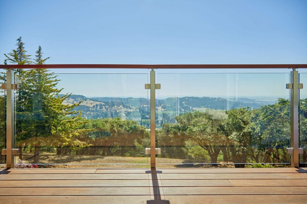 Sleek Wood Handrail with Glass Panels