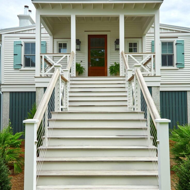 White Wooden Stairs with Cable Railing