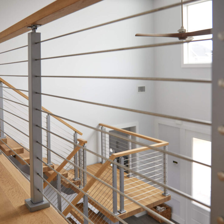 Rod railing with wooden handrail