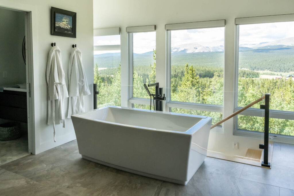 Interior Glass Railing Next to a bathtub over looking Colorado Mountains
