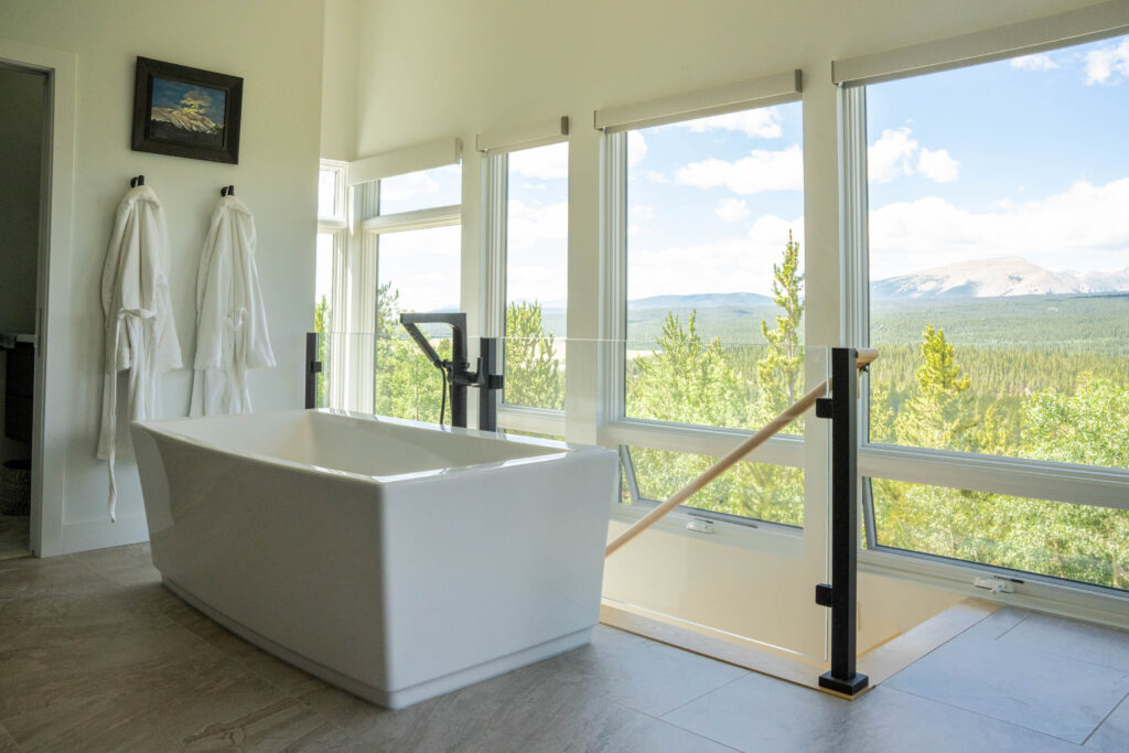 Interior Glass Railing Next to a bathtub over looking Colorado Mountains