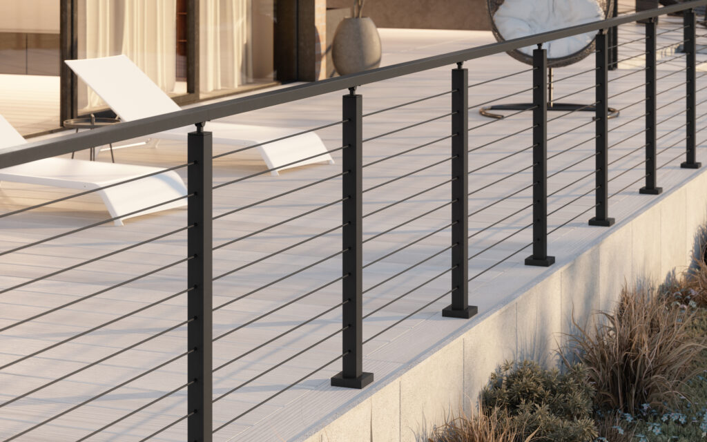 Sleek, black cable railing on a concrete deck
