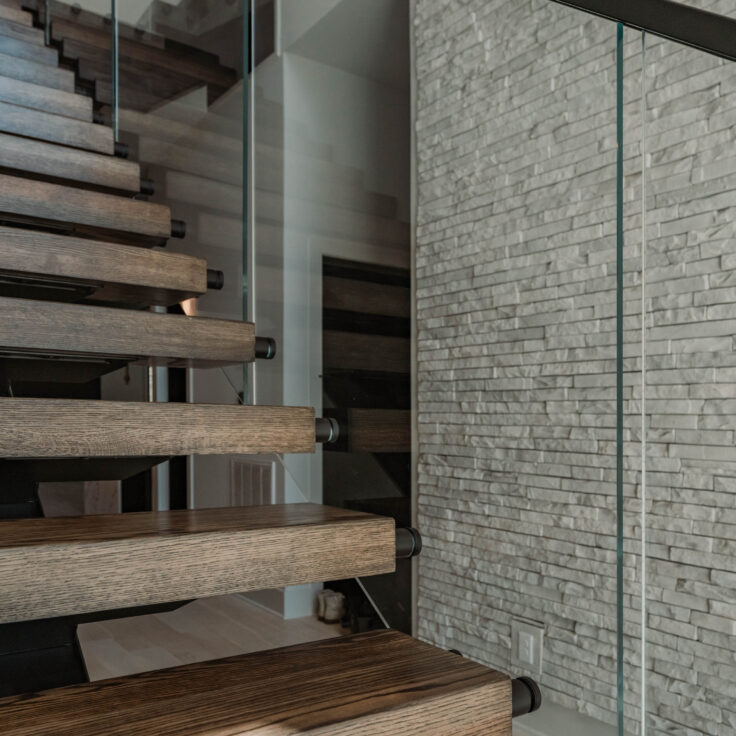 Dark Stained Wooden Stair Treads with Black Metal Stringer