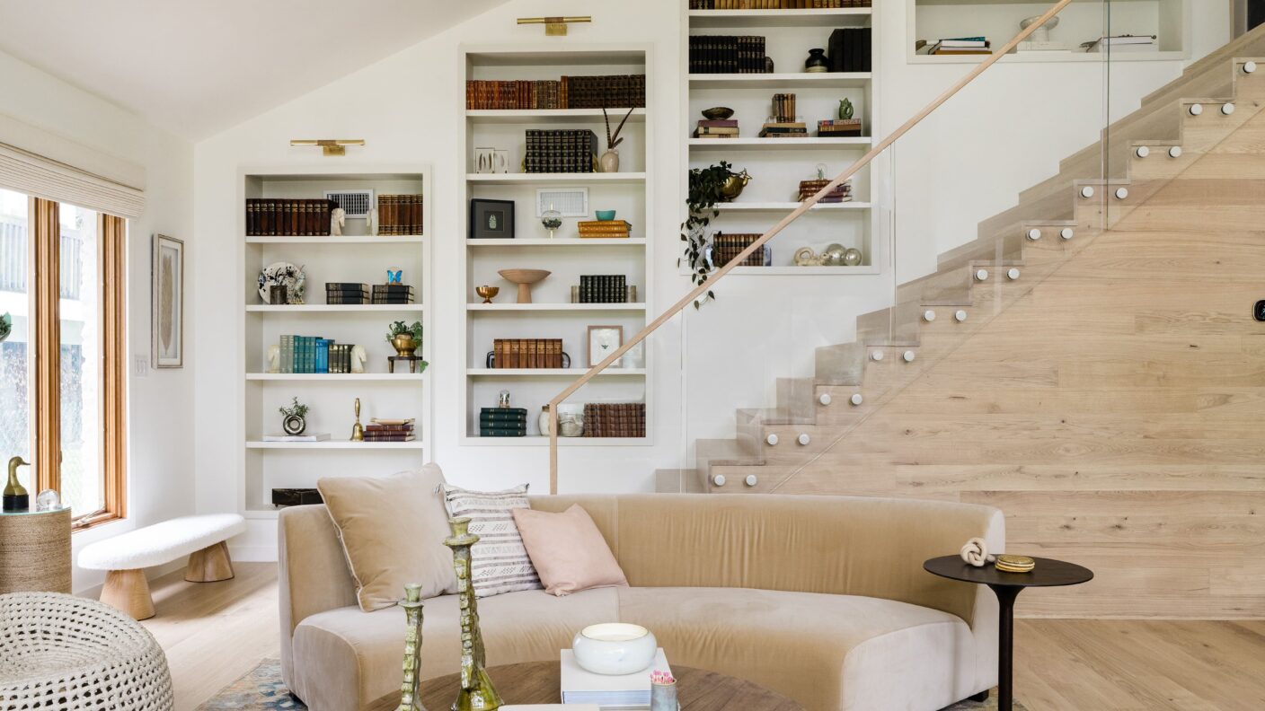 Glass Railing with a wooden handrail and white glass pins